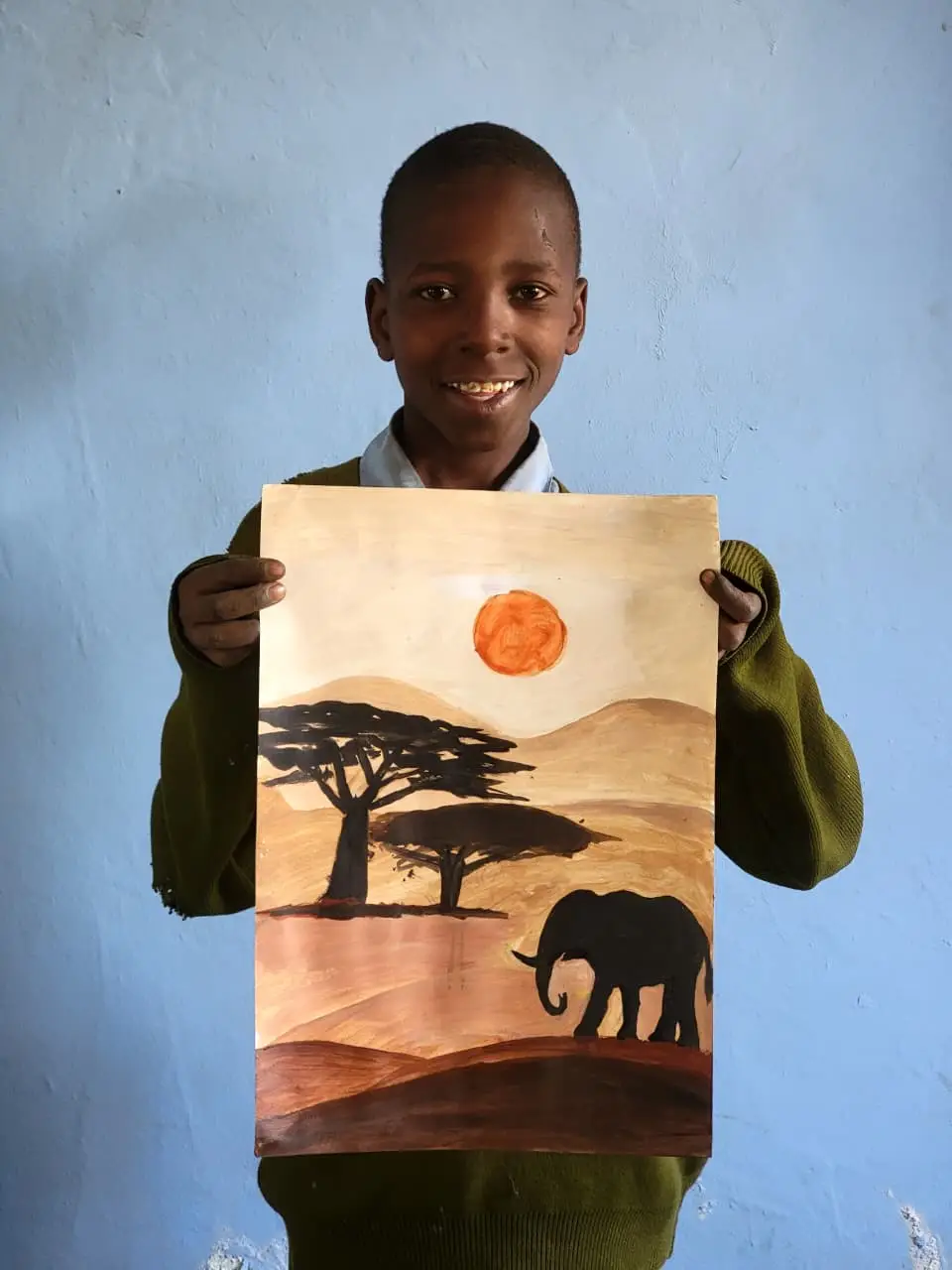 Benjamin Longidariki holding his original safari painting